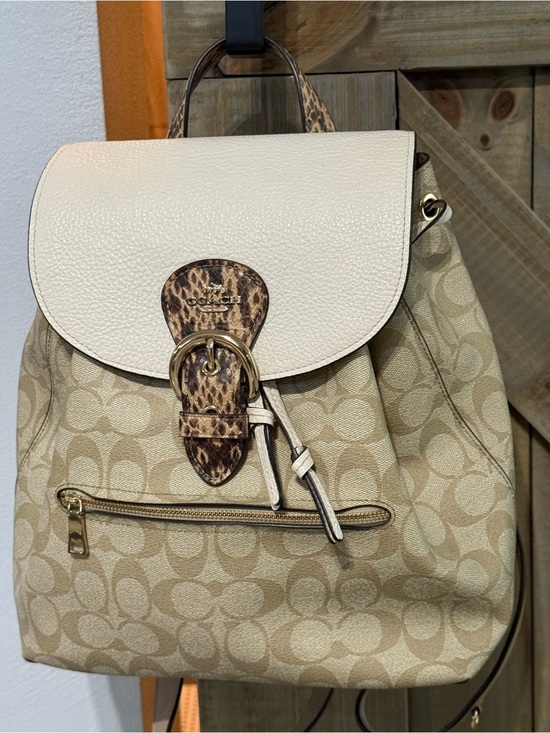 coach backpack tan Court In Signature Canvas With Bee Print Crafted of Signature coated canvas and refined pebble leather this everyday backpack for women features a roomy interior double zip closure and an outside zip pocket Coach Backpack Tan Buy Coach